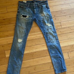 Distressed DIESEL Women's Slim Fit Blue Jeans